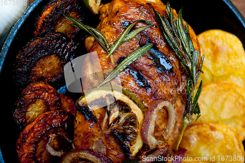 Image of roasted grilled BBQ chicken breast with herbs and spices 