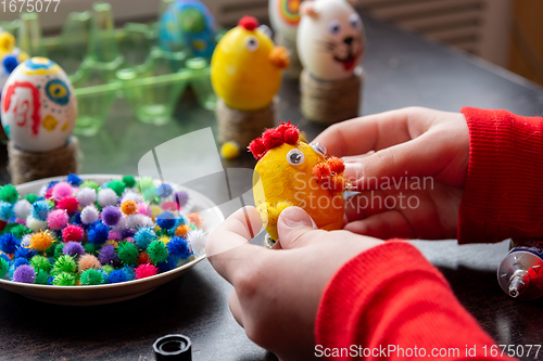 Image of A child makes gifts with his own hands for Easter