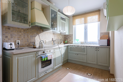 Image of Interior of a modern spacious kitchen in country style