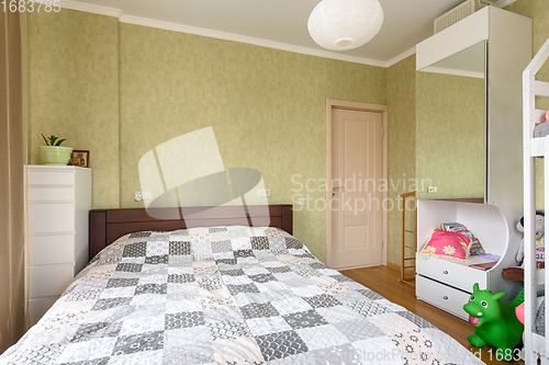 Image of Bedroom interior with a large double bed