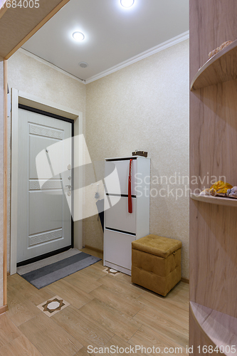 Image of The interior of an ordinary hallway in a small apartment