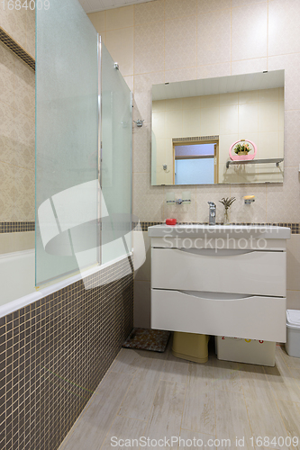 Image of Glass shower partition in the bathroom interior
