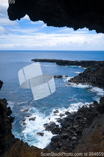 Image of Cliffs and pacific ocean landscape vue from Ana Kakenga cave in 