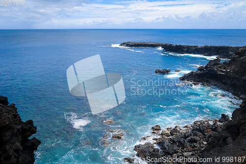 Image of Cliffs and pacific ocean landscape vue from Ana Kakenga cave in 