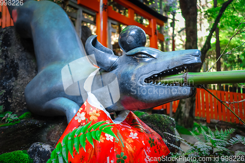 Image of Fox purification fountain at Fushimi Inari Taisha, Kyoto, Japan