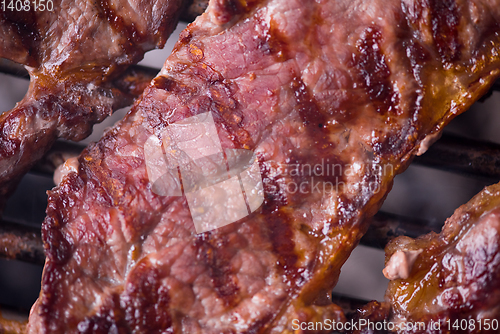 Image of delicious grilled meat on barbecue