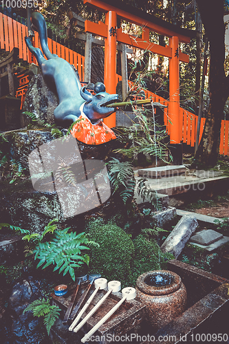 Image of Fox purification fountain at Fushimi Inari Taisha, Kyoto, Japan