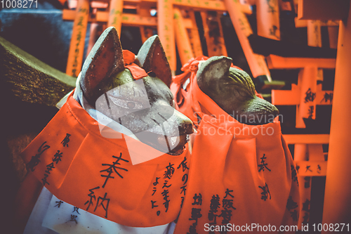 Image of Fox statues at Fushimi Inari Taisha, Kyoto, Japan