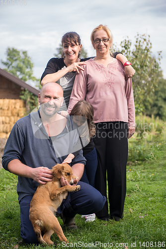 Image of portrait of happy family at farm