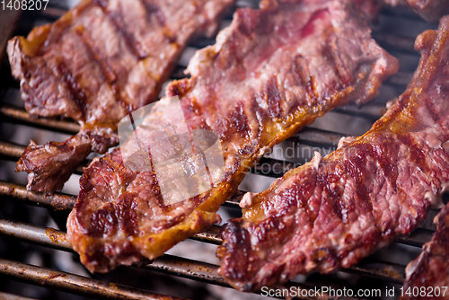 Image of delicious grilled meat on barbecue