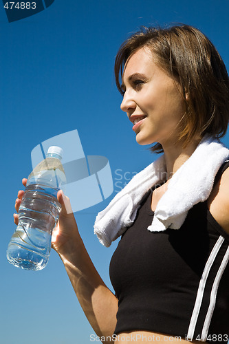 Image of Sporty caucasian girl with water bottle