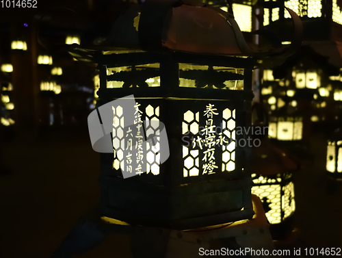 Image of Lanterns lighting in the dark, Kasuga-Taisha Shrine, Nara, Japan