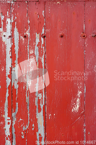 Image of Old wood board painted red