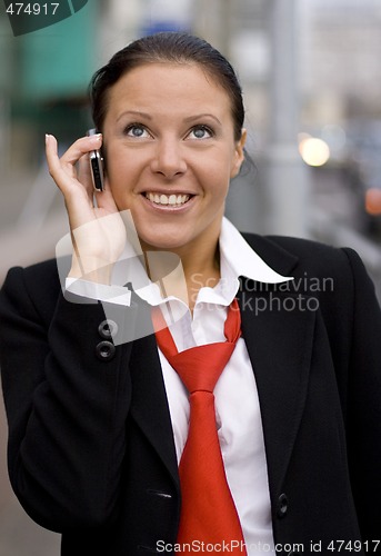 Image of businesswoman speaking by phone