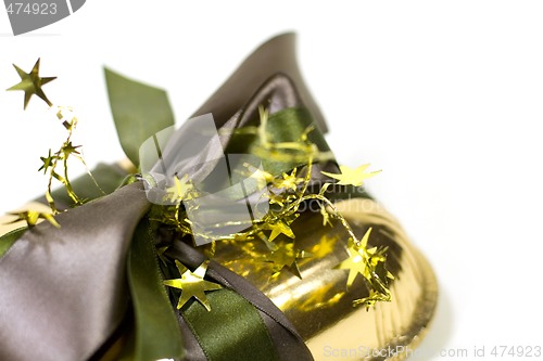 Image of gold gift box with decorations