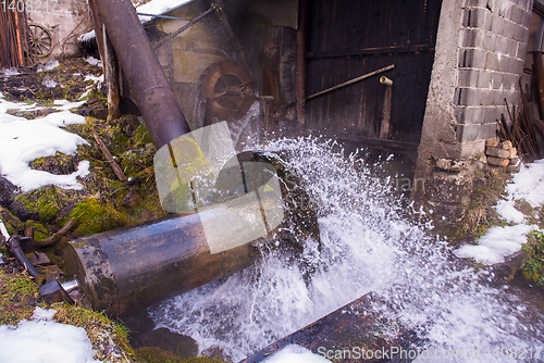 Image of Rural landscape with old watermill in woods