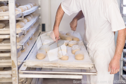 Image of bakers preparing the dough