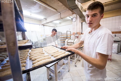 Image of bakers preparing the dough