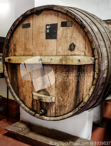 Image of wood wine barrels in a winery