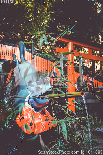 Image of Fox purification fountain at Fushimi Inari Taisha, Kyoto, Japan