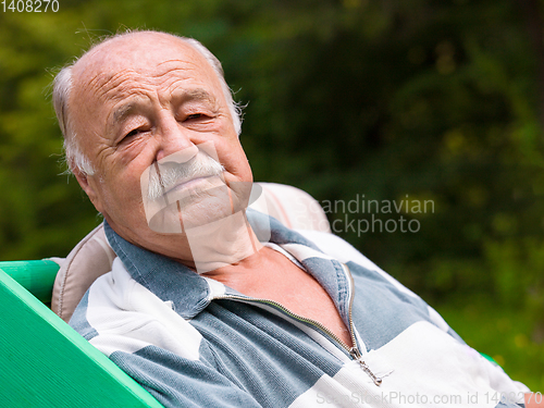 Image of portrait of senior man with mustache