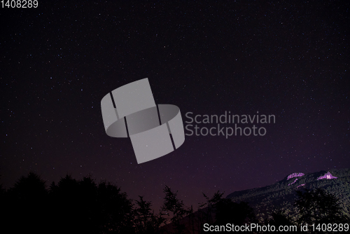 Image of night sky above Mountain