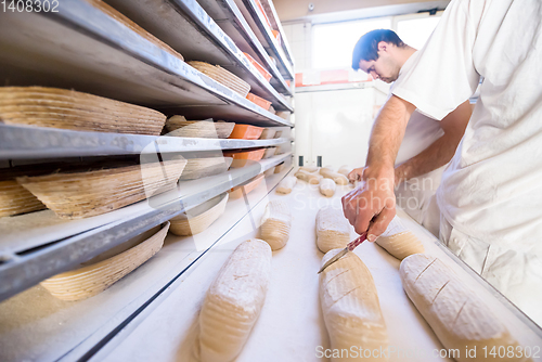 Image of bakers preparing the dough