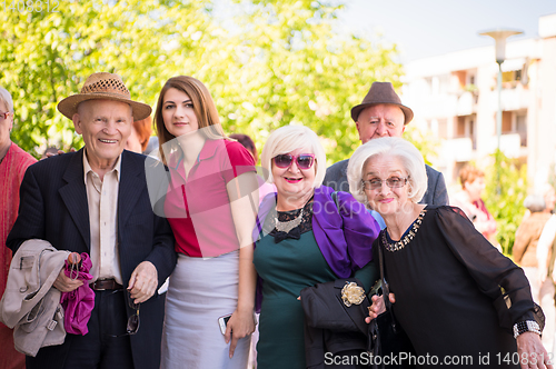 Image of group portrait of senior people with geriatric nurse