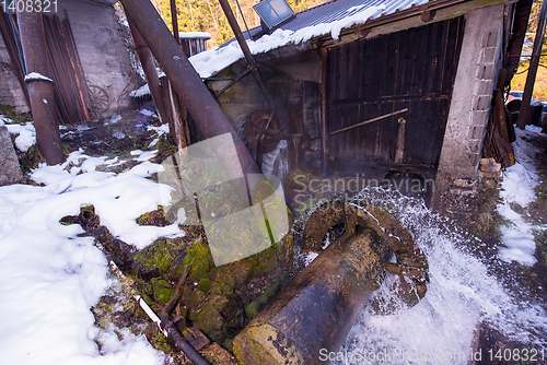 Image of Rural landscape with old watermill in woods