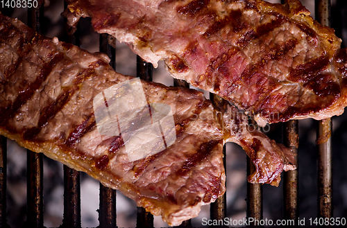 Image of delicious grilled meat on barbecue