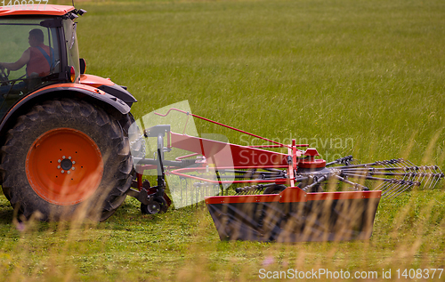 Image of Man driving tractor