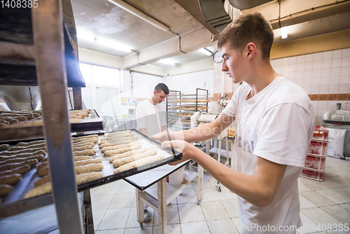 Image of bakers preparing the dough