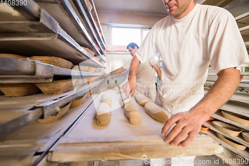 Image of bakers preparing the dough