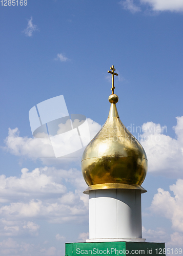 Image of Gold plated dome with a cross