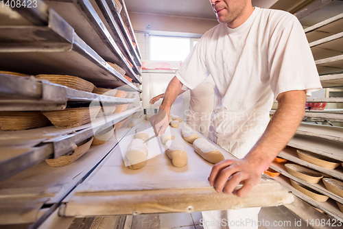 Image of bakers preparing the dough