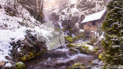 Image of Rural landscape with old watermill in woods