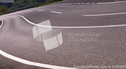 Image of asphalt road in beautiful countryside