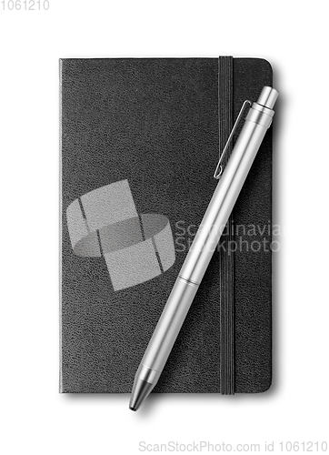 Image of black closed notebook and pen isolated on white
