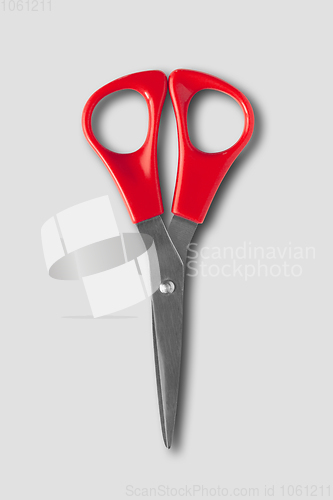 Image of Pair of scissors isolated on grey background