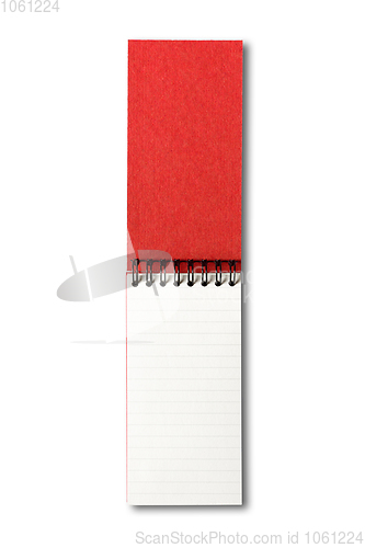 Image of Blank open spiral notebook isolated on dark grey