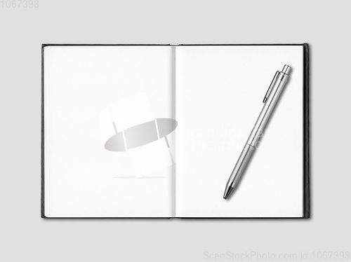 Image of Blank open notebook and pen isolated on grey