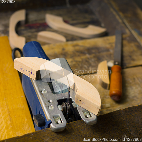 Image of Wooden handles for furniture from alder and fretsaw