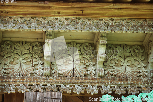 Image of Wooden patterns on the eaves of an old house