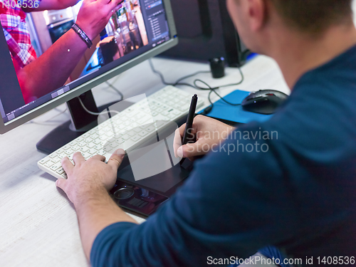 Image of Closeup of Graphic Designer Working at Workplace