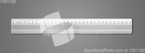 Image of Metal ruler isolated on dark grey background