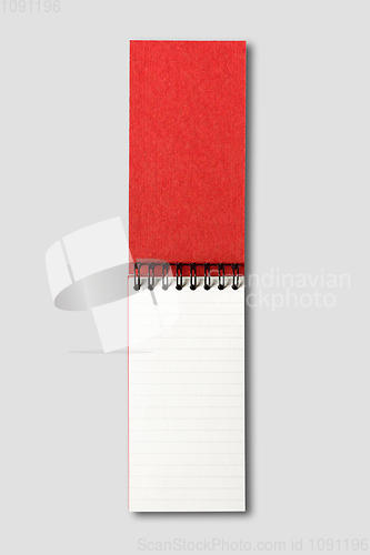 Image of Blank open spiral notebook isolated on grey