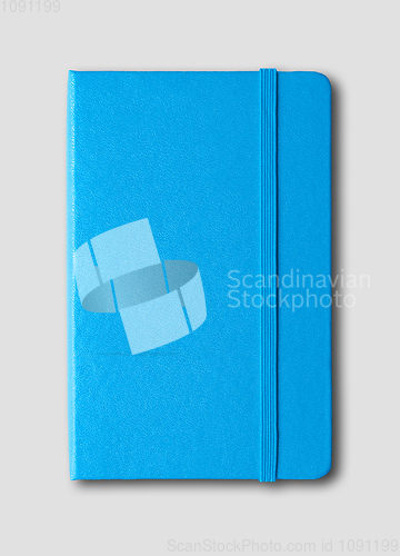 Image of blue closed notebook isolated on grey