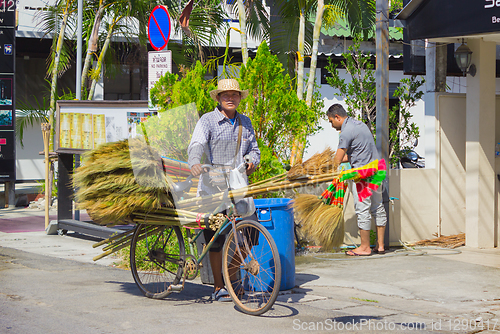 Image of Thais selling brooms on the streets