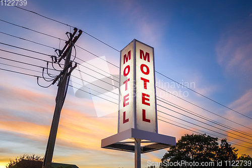 Image of Vintage motel sign at sunset 