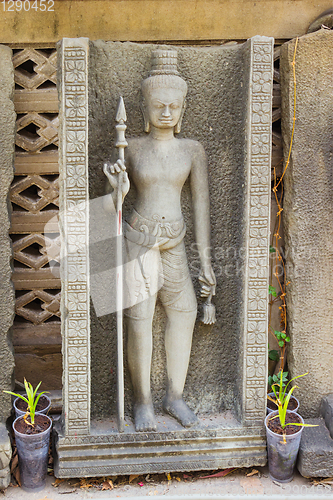 Image of Small statue of the hero mythology of concrete. Bangkok